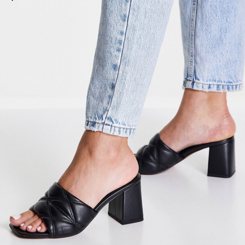 Padded block heeled mules in black